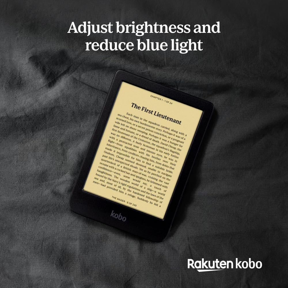 Kobo Clara BW con la luz cálida encendida sobre una sábana