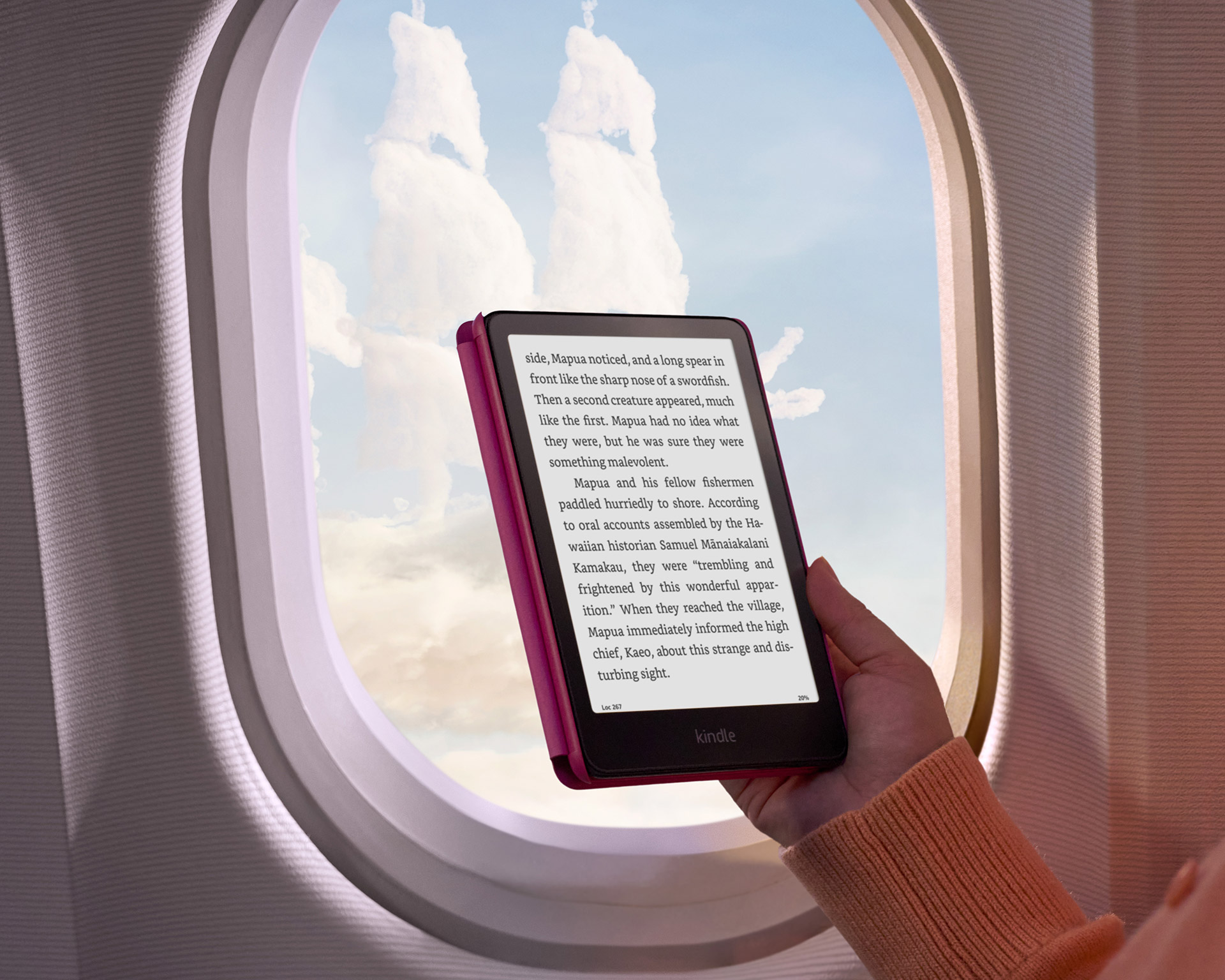 Kindle en la ventana de un avión