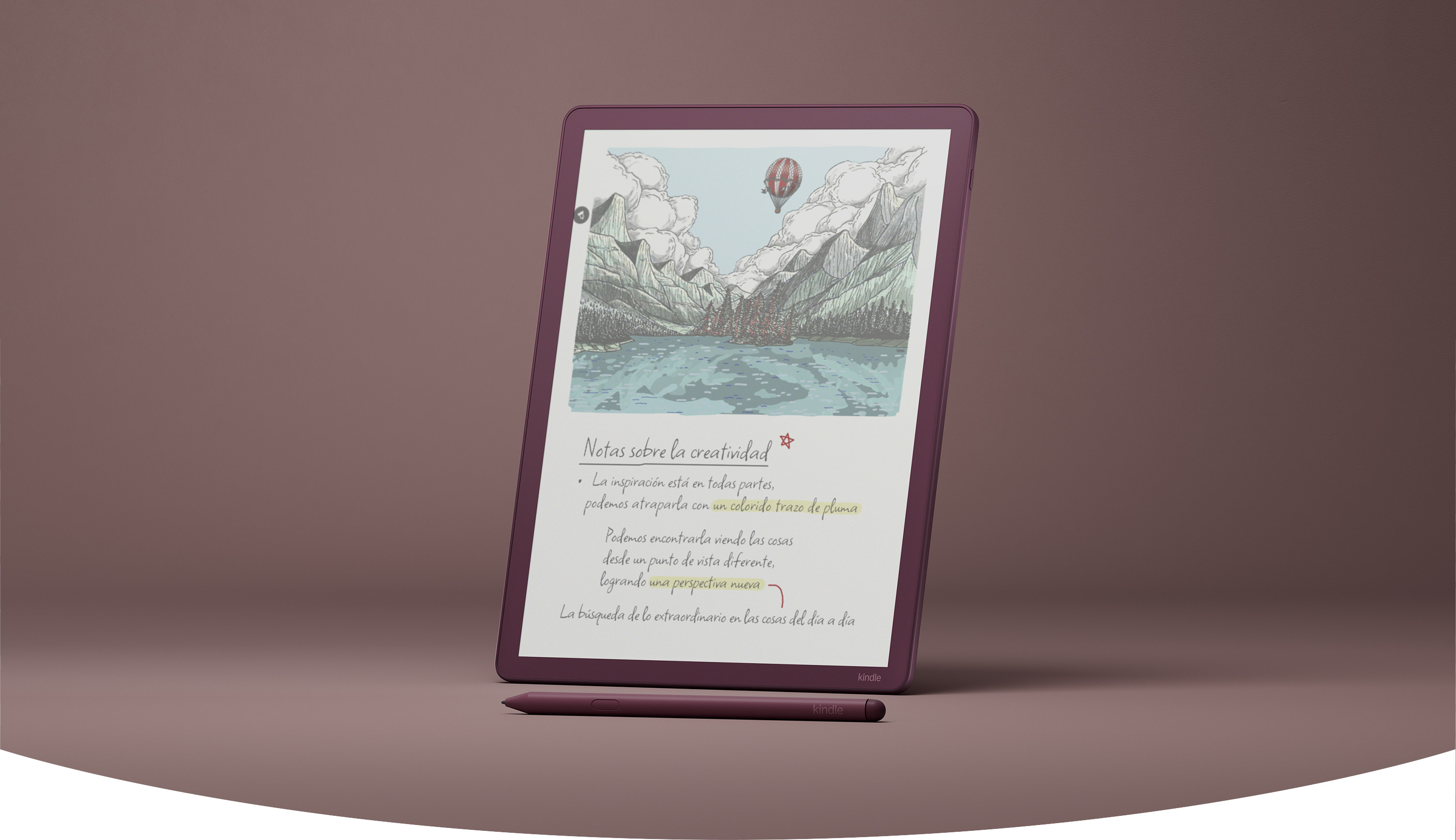 Kindle Scribe Colorsoft de pie mostrando un cuaderno con un dibujo a color y notas a mano en español, junto a su lápiz